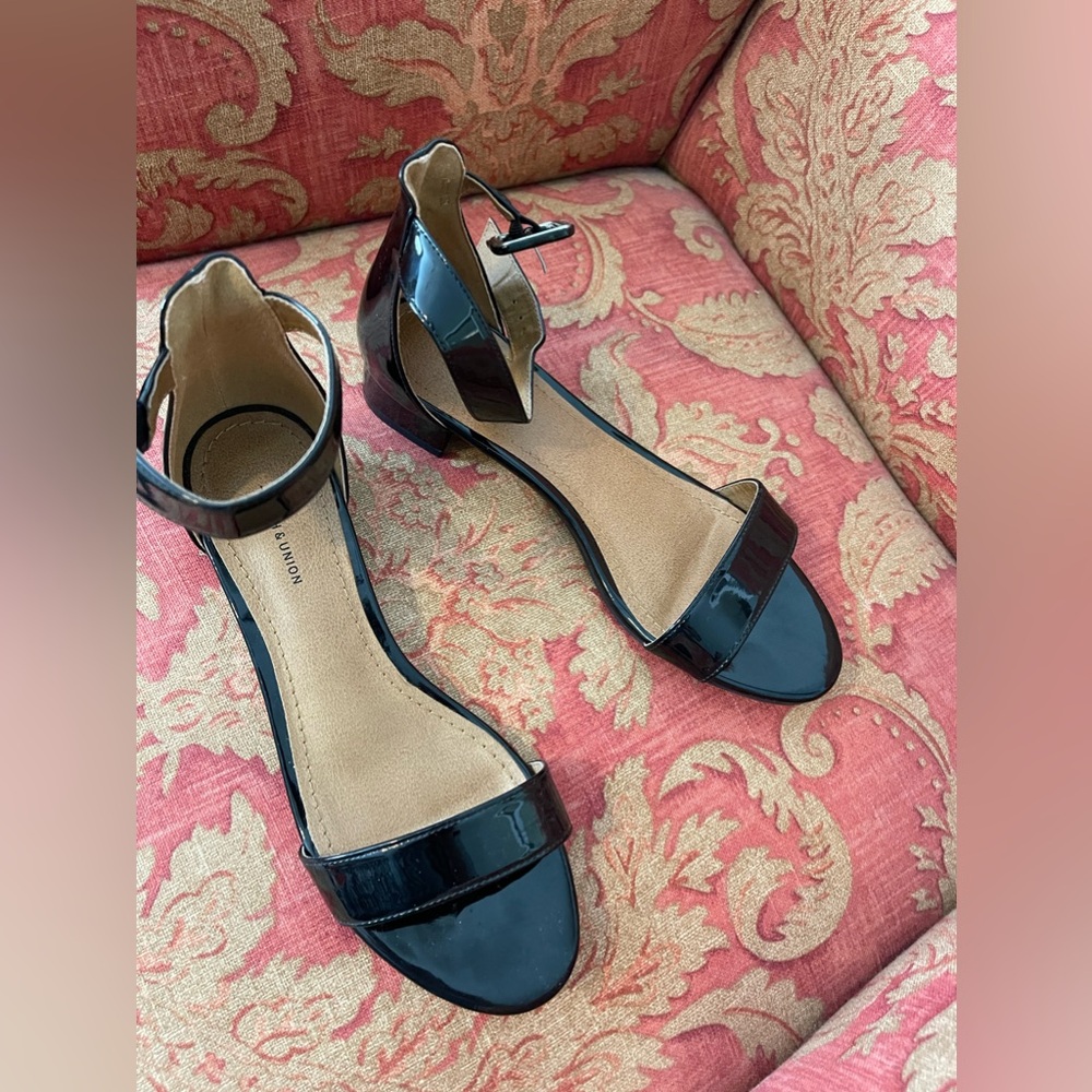 Black patent leather low heel sandals